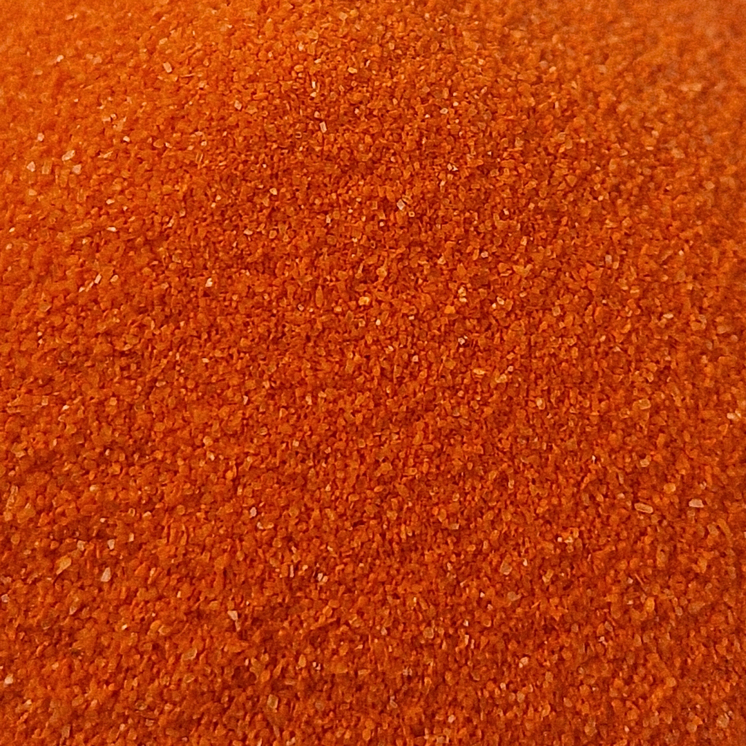 Arena de color naranja