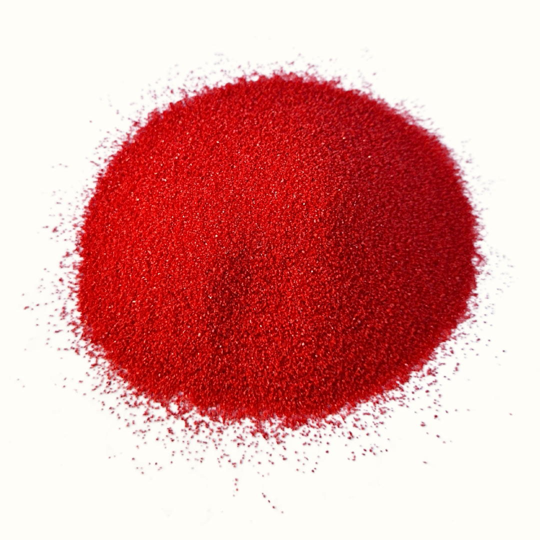Arena de color rojo fuerte