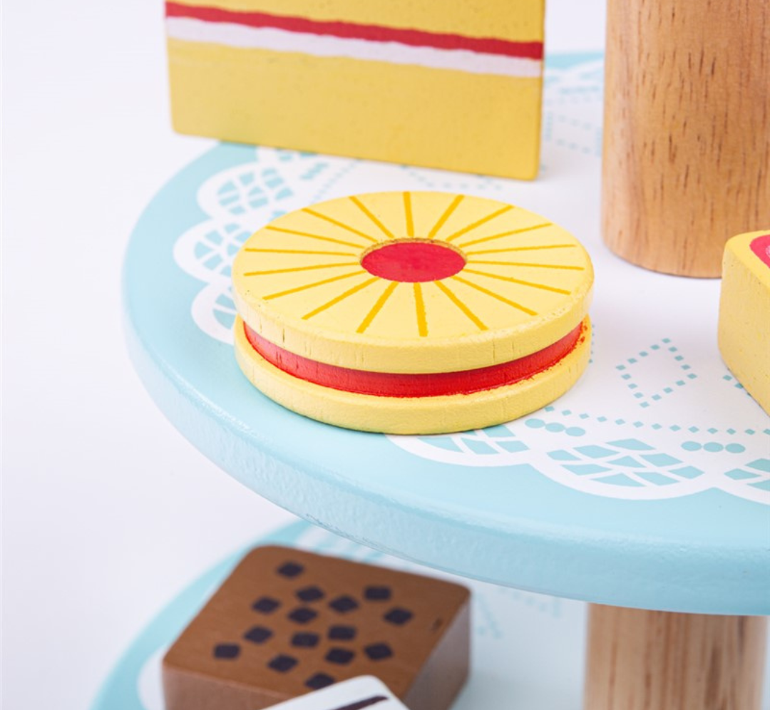 Expositor de pasteles con 9 dulces